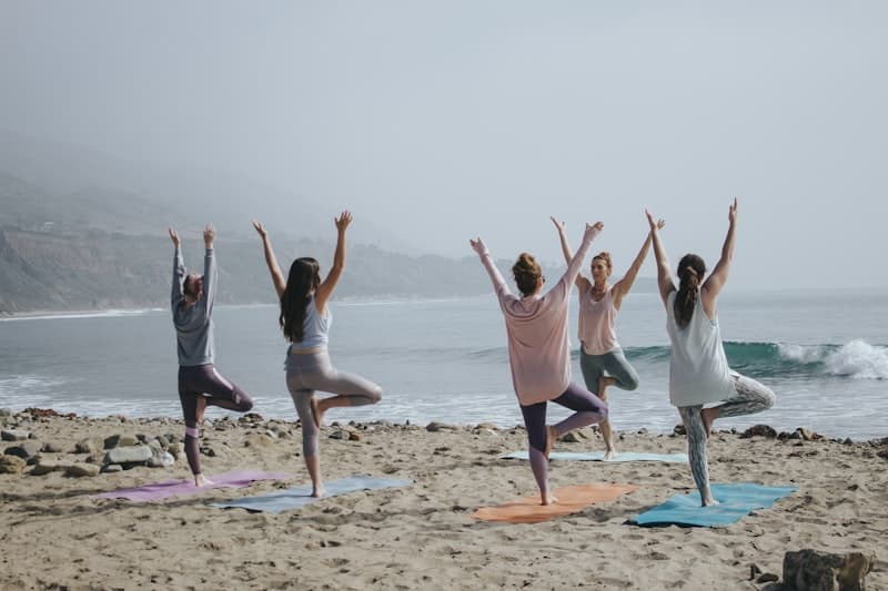Participants gathered in a warm, supportive holistic healing session